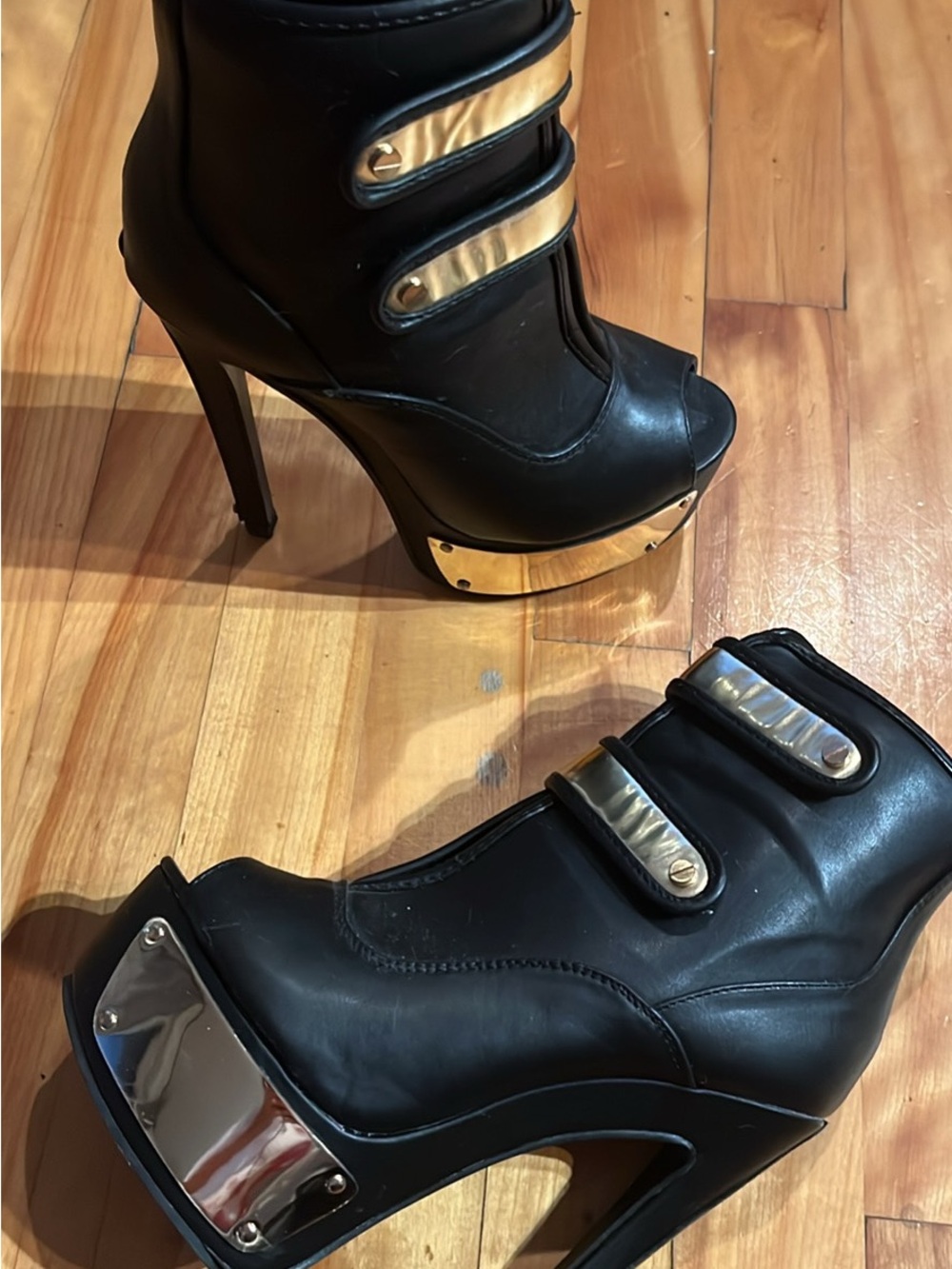 Black Leather High Heel Platform Booties with Gold Accents